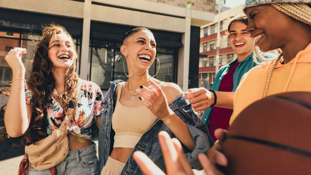 Group of young adults laughing