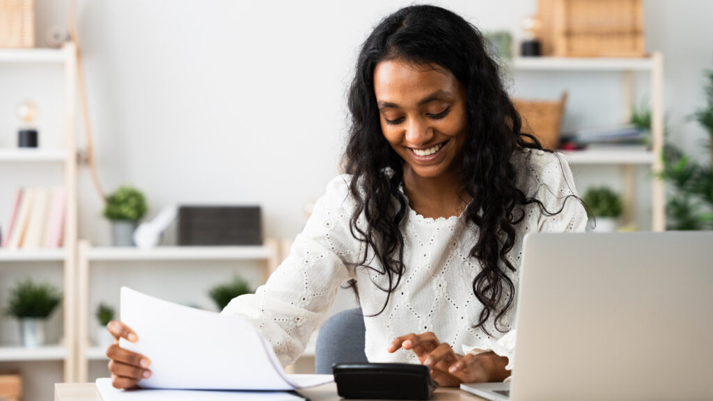Lady happily working with her finance